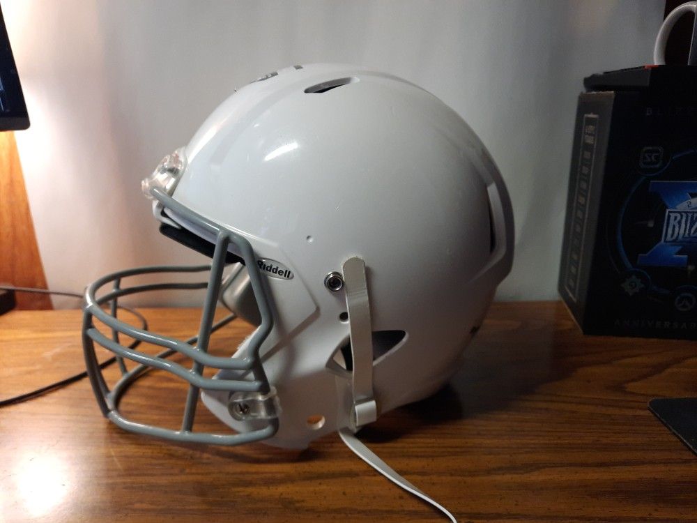 Riddell Victor Youth Football Helmet with Attached Facemask